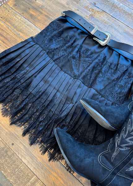 Lace slip skirt is versatile in style.  The lace is layered with a solid fabric under the lace