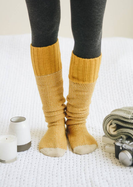 two tone slouch socks in mustard yellow and off-white toe