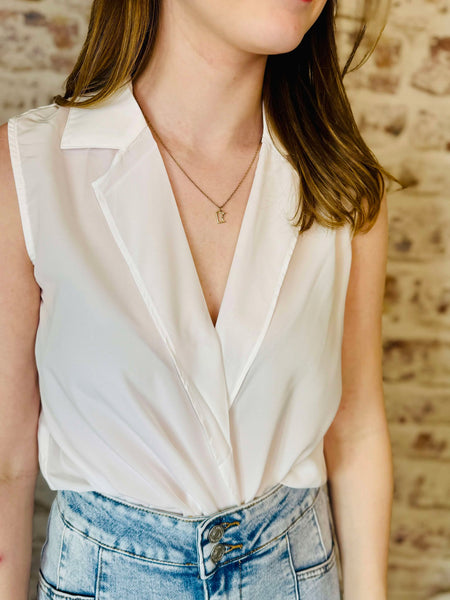 Sleeveless Surplice Blouse