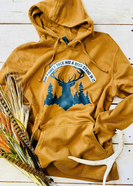 brown solid hoodie with screen print of a deer and the saying "our family Tree Has a Deer Stand in It"