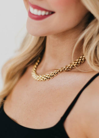 gold color woven chain necklace with length form 16-18 inches.  It's also waterproof