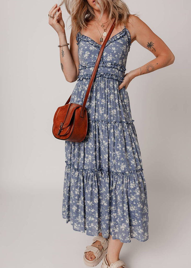 Sage green, ruffle shorts to add a touch of feminine flair to your wardrobe. Tie front and an elastic waist for easy, comfortable wear. feeling relaxed (and maybe even a litt
model wearing a cross over purse and sandals
Material: 85%Lyocell+15%Polyamide
Care Instructions: Machine wash cold.