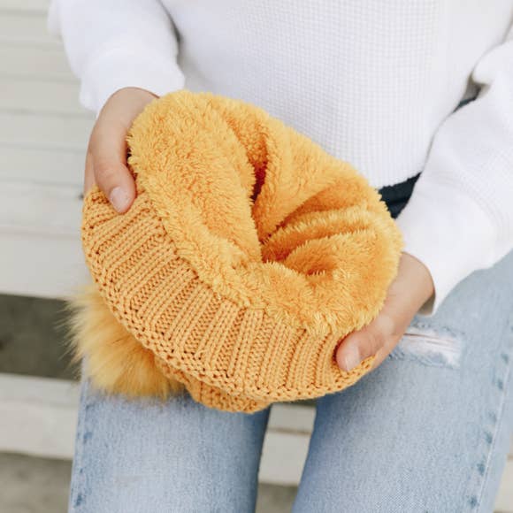 Pom Beanie with Faux Sherpa Lining