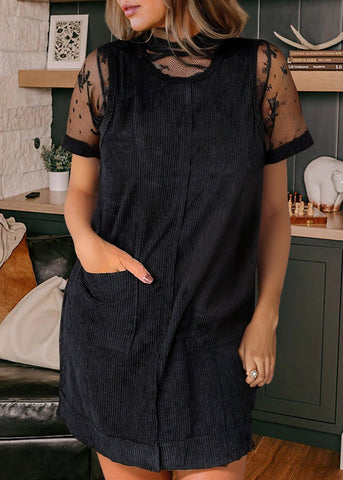 black corduroy mini dress with front pockets.  material is light weight and 2 front pockets.   Also, sleeveless