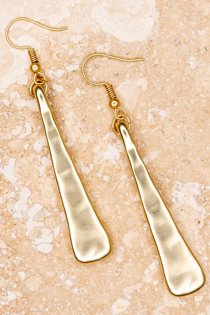 Hammered worn gold long triangle shape fishhook drop earrings. 