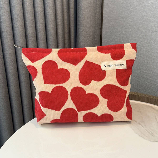 corduroy heart makeup bag.  off white with block style red hearts