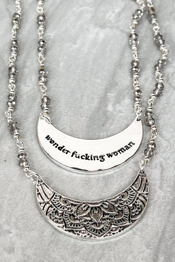 "Wonder F*&$@ woman" silver double-sided necklace can be worn with statement or adorned