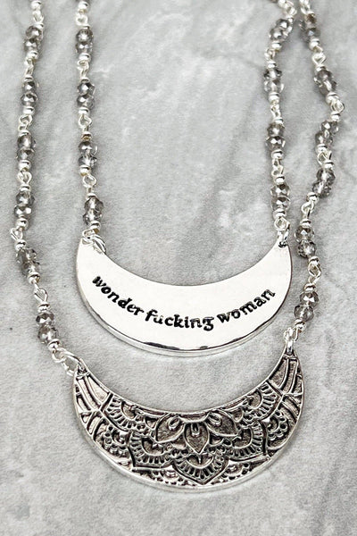 "Wonder F*&$@ woman" silver double-sided necklace can be worn with statement or adorned