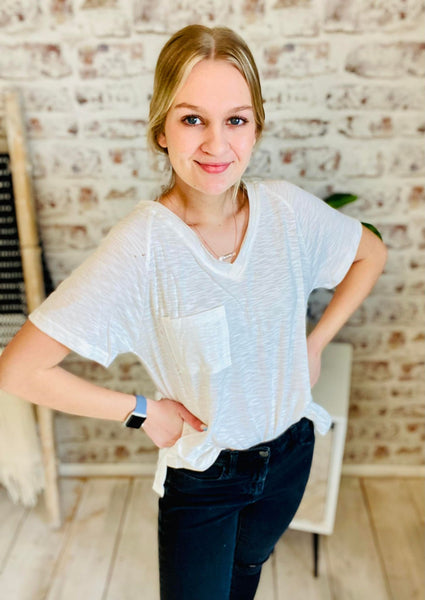 Woman wearing Basic V-Neck White Tee with a pocket