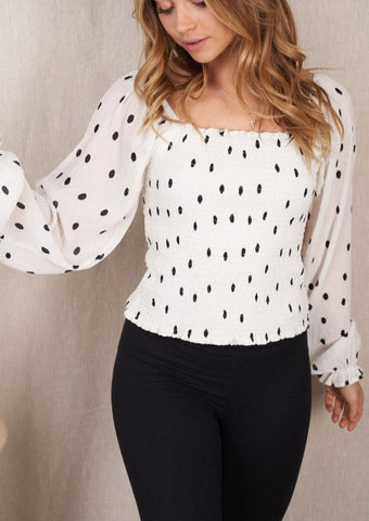 Woman wearing Poet Sleeve Black and White Top 
